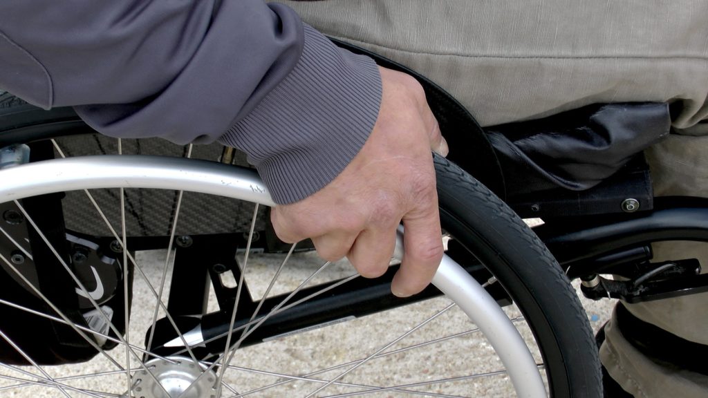 Disabled Man in Wheelchair in court for insurance